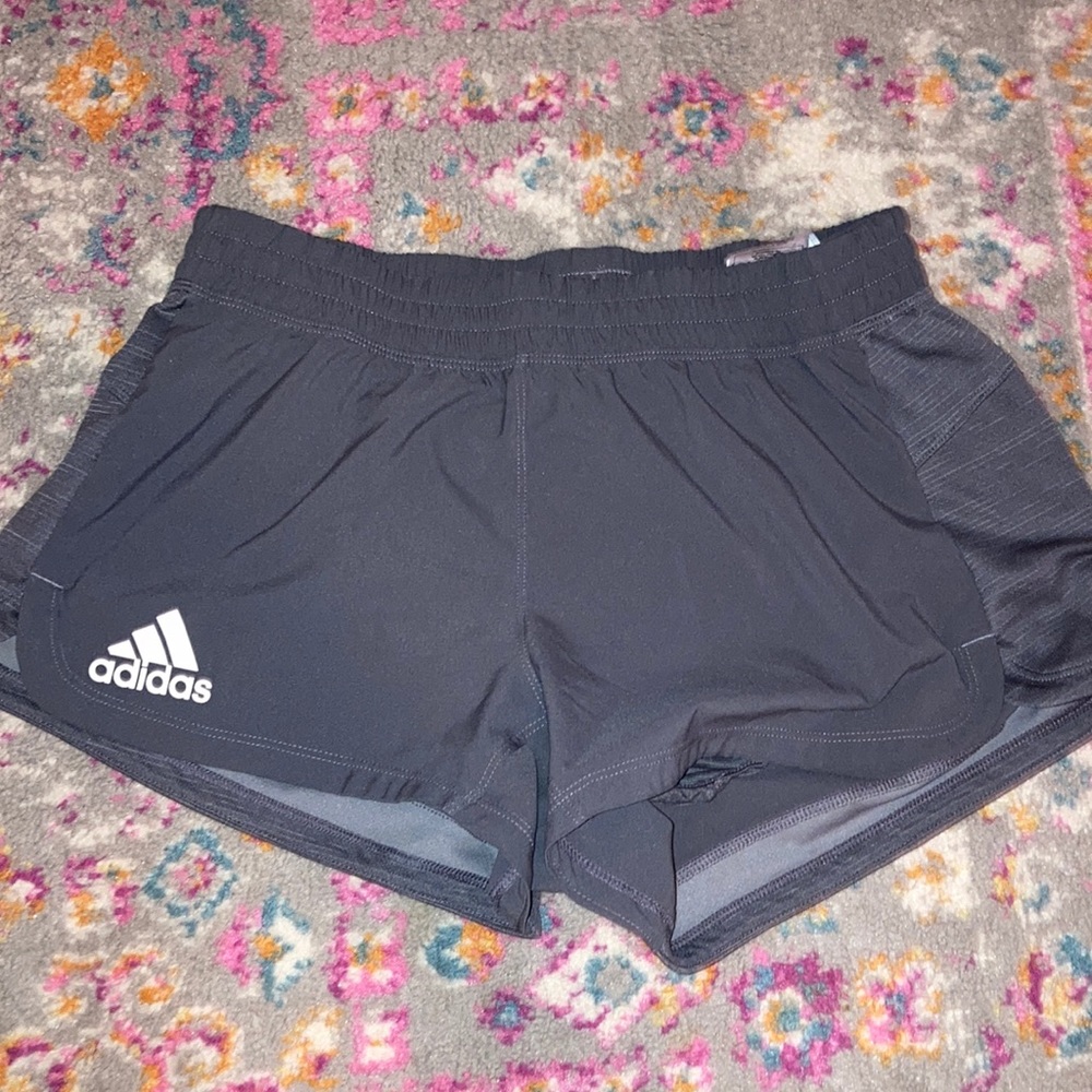 Grey adidas running shorts